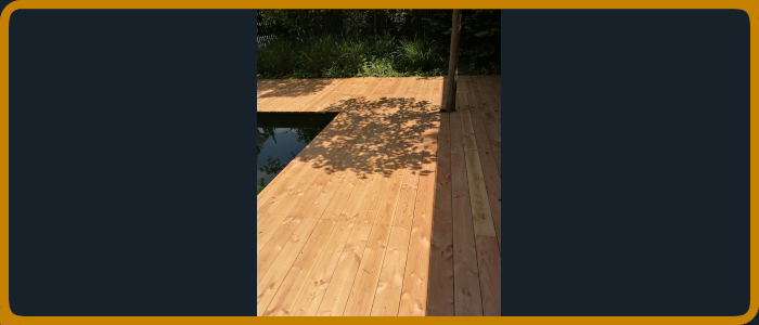 Holzterrassenbau um Pool in Massivholz mit Alu Unterkonstruktion